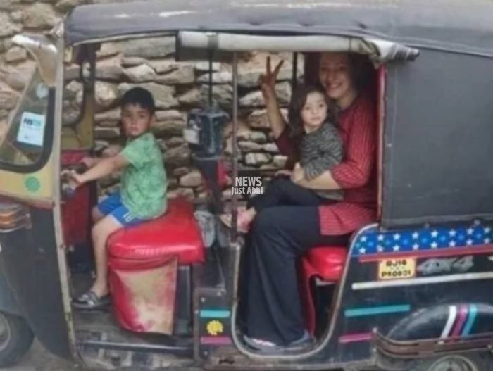 french woman in auto with children